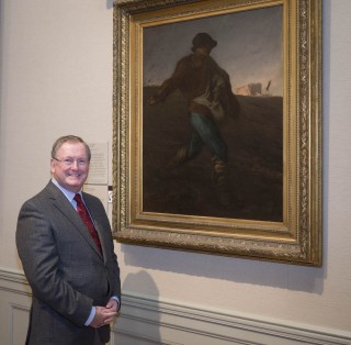 Malcom Rogers stands next to Millet's "The Sower" © Museum of Fine Arts, Boston