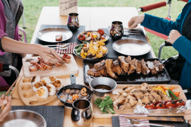 people eating barbecue food in niigata