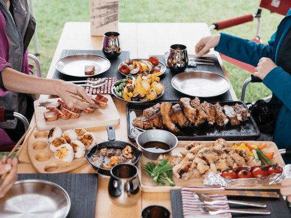 people eating barbecue food in niigata