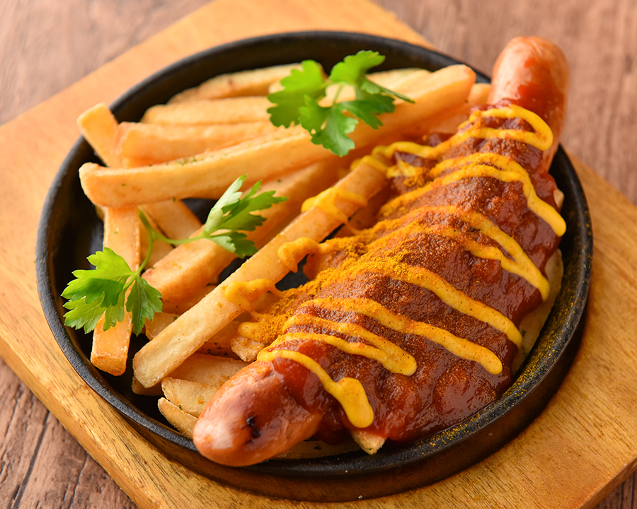 Schmatz sausages with curry sauce