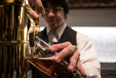 Bartender pouring beer in Tokyo