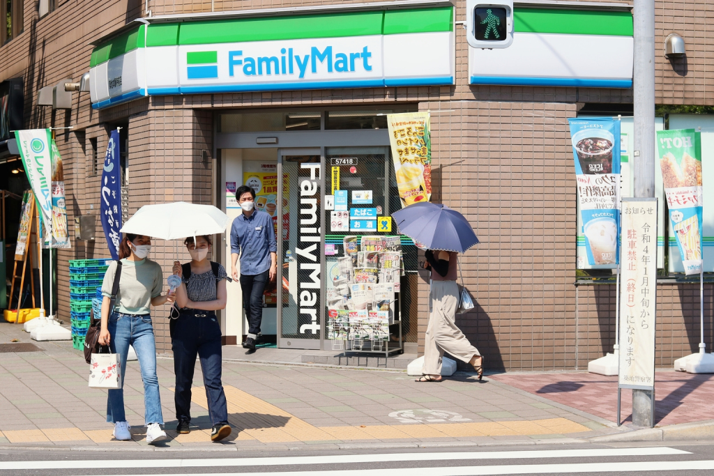 Modern higasa outside Family MartJapanese parasol / Ned Snowman shutterstock.com